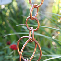 Rain chains are a beautiful and functional alternative to traditional, closed gutter downspouts. Guiding rain water visibly down chains or cups from the roof to the ground, rain chains transform a plain gutter downspout into a pleasing water feature. From the soft tinkling of individual droplets to the soothing rush of white water, they are a treat to listen to.